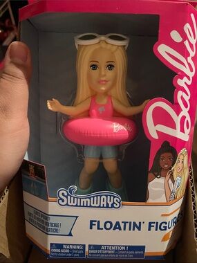 Barbie Blonde Doll with Pink Swimsuit and Pink Swim Ring